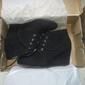 Arizona friend ankle booty size 9 and 1/2 black with three inch wedge heel